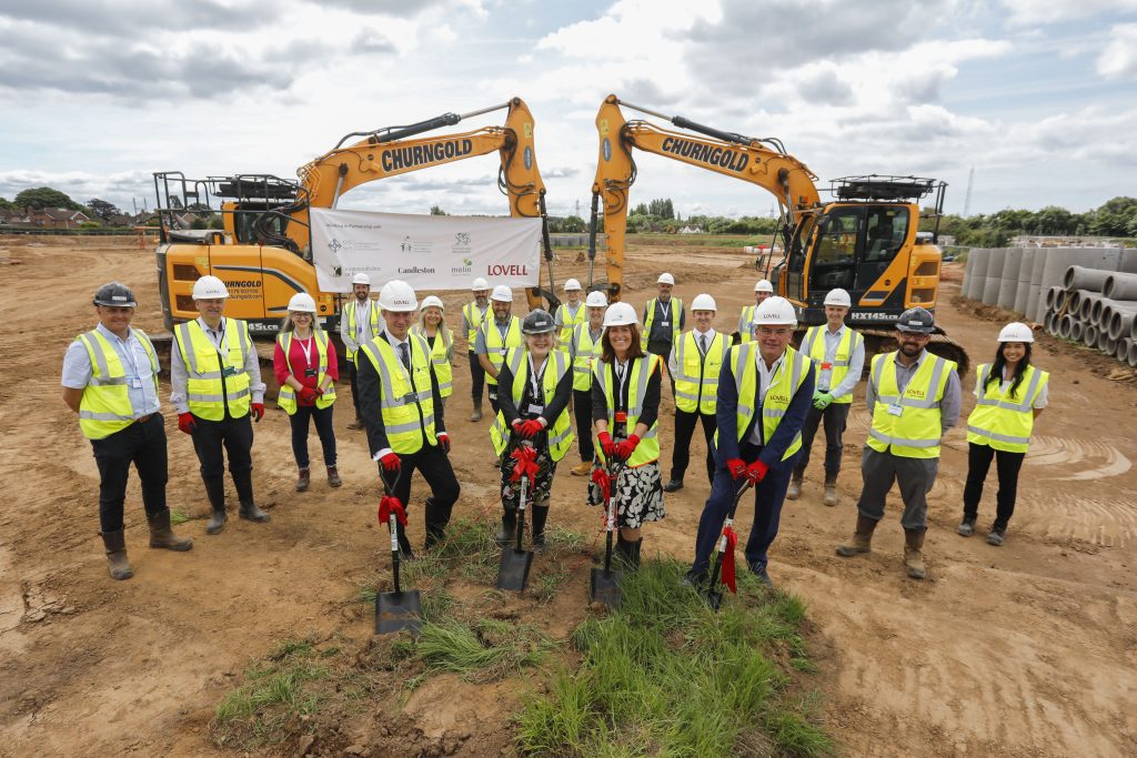 Above: Representatives from Monmouthshire County Council, Lovell, Melin Homes and Candleston come together for the ground breaking ceremony at the Crick Road site