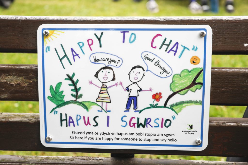 The winning plaque design will feature on all 'Happy to Chat' benches - close up of the plaque on the bench at Chepstow's Dell