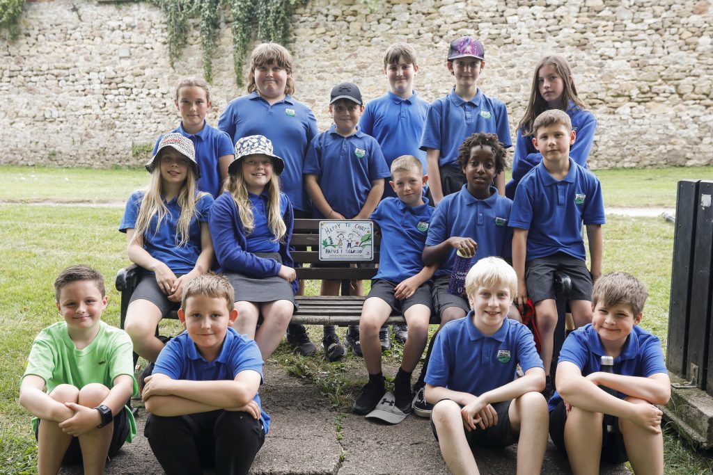 Pupils from The Dell school attended and read poems about the importance of park benches - group photo