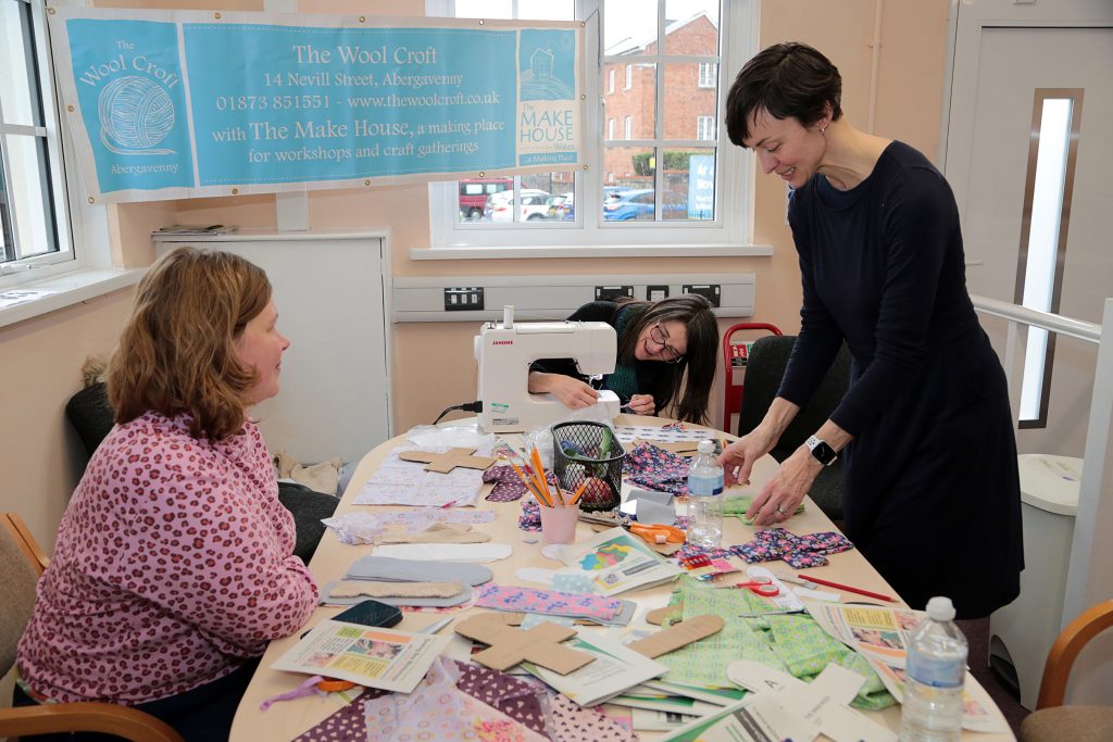 Ginevra (right) from The Wool Croft in Abergavenny giving a workshop on making reusable towels