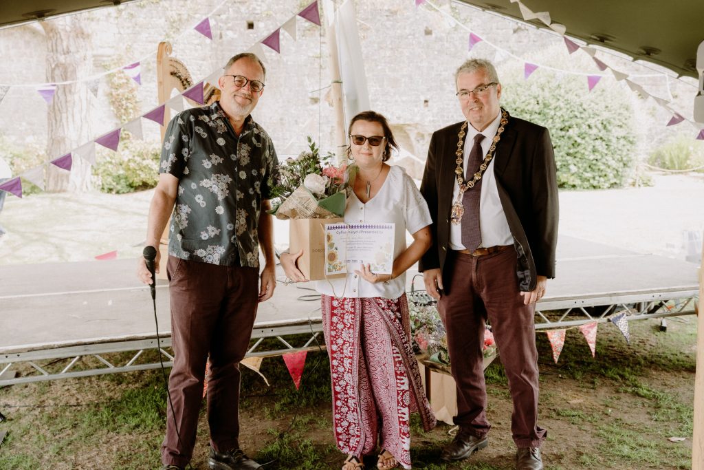 Cllr Ian Chandler, Sam (a foster carer) and Cllr Meirion Howells