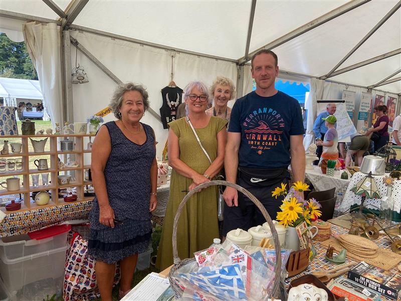 Cabinet Member for Climate Change and the Environment Cllr Catrin Maby visiting the ReUse Shop at Usk Show