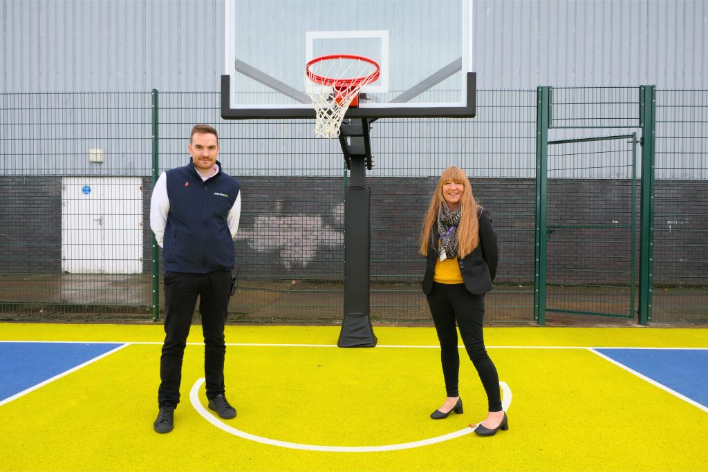Cabinet Member for Equalities and Engagement Cllr Angela Sandles Joe Killingley, Caldicot Leisure Centre manager on the new improved Basketball court at Caldicot Leisure Centre
